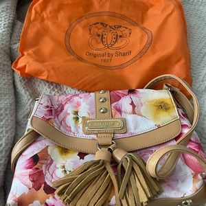 Leather handbag. Floral print